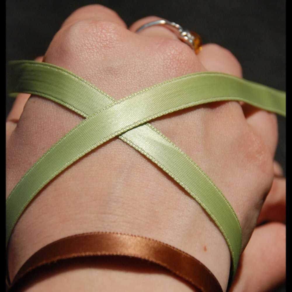 Selection of 2,300 low-price Satin wristbands, 11 colours two low price satin wristbands on wrist en