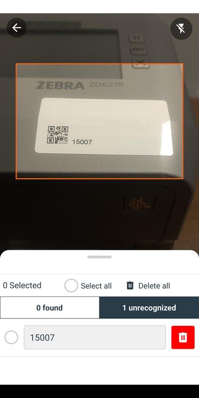 SAM scan screen: QR code label read and flagged as unrecognized